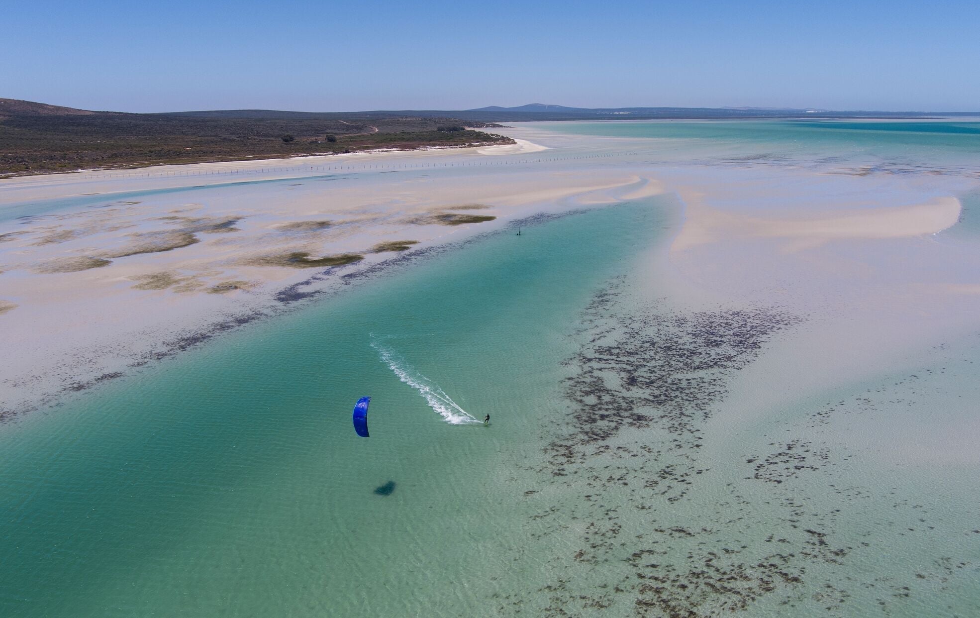 How Tides Affect Kitesurfers or – Tides and Kites: A Love Story - The Kitesurf Centre