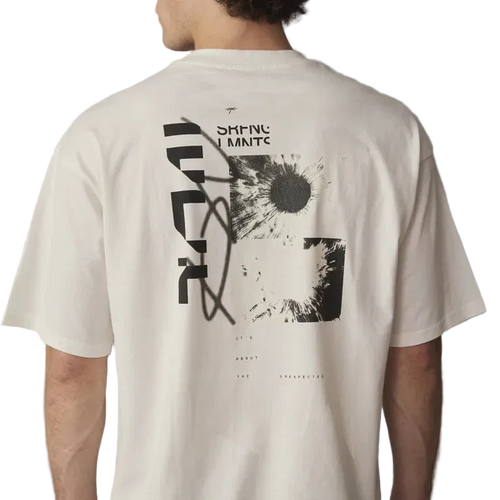 Person wearing a white t-shirt with black graphic design on the back against a gray background