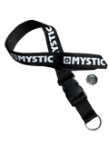 Black strap with 'Mystic' branding on a wooden surface