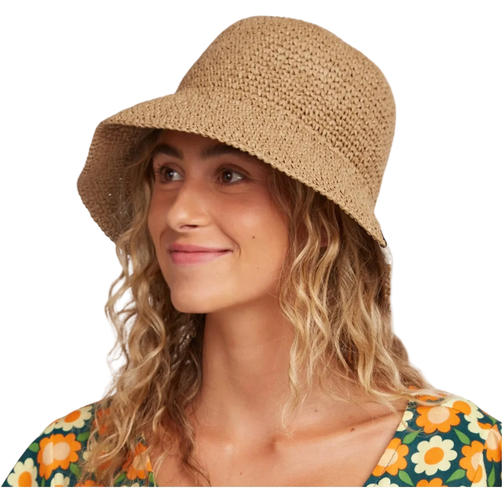 Woman wearing a straw hat with a white background