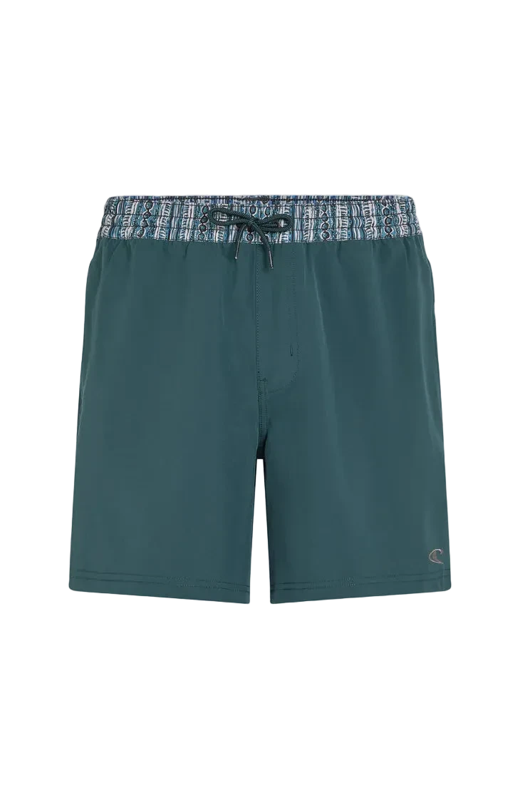 Green shorts with a patterned waistband on a white background