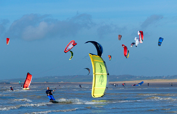 Why take kitesurfing lessons at Camber Sands?