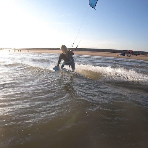 kitesurfing into sunset